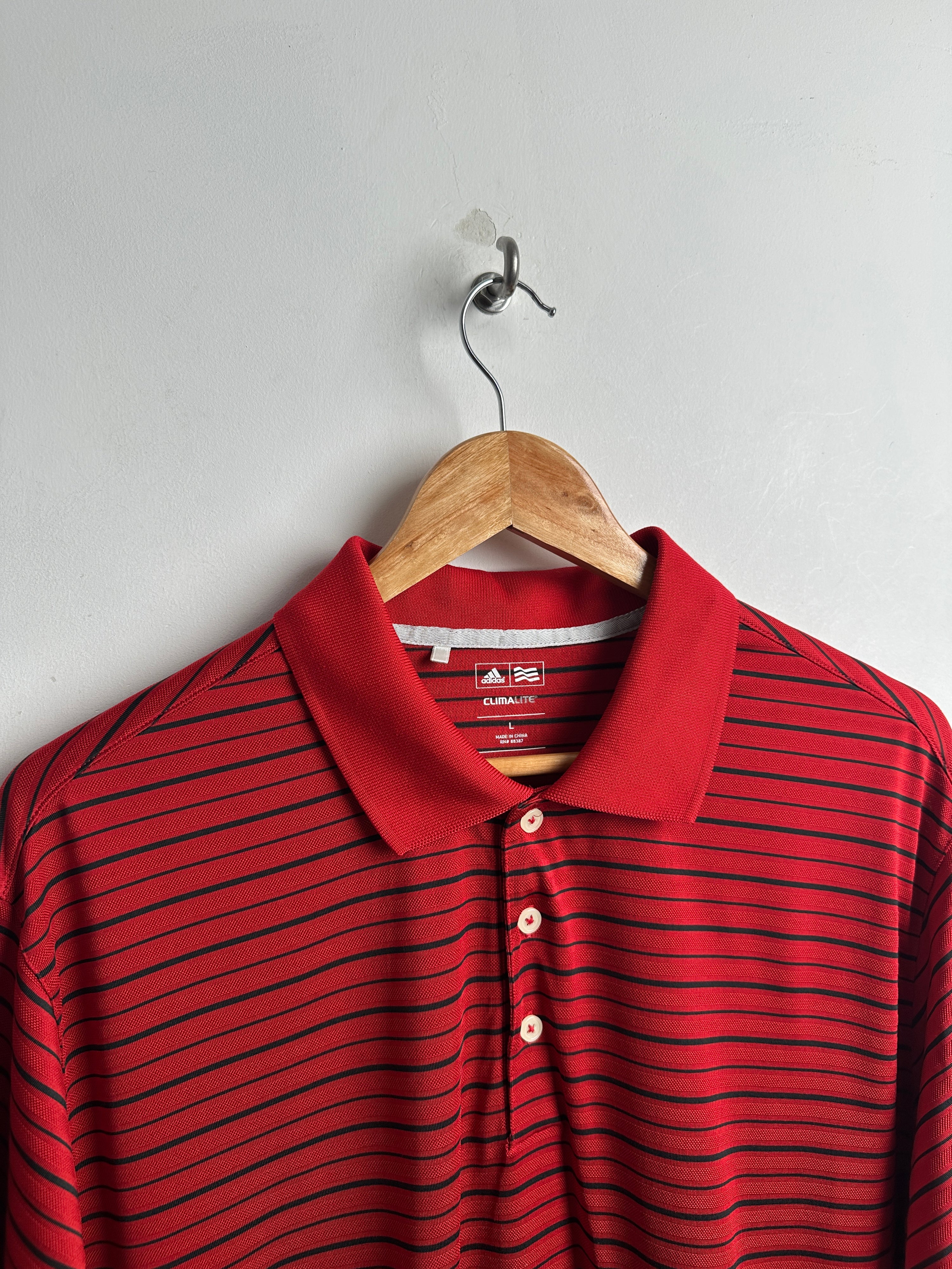 ADIDAS GOLF short-sleeve polo shirt in red with black stripes