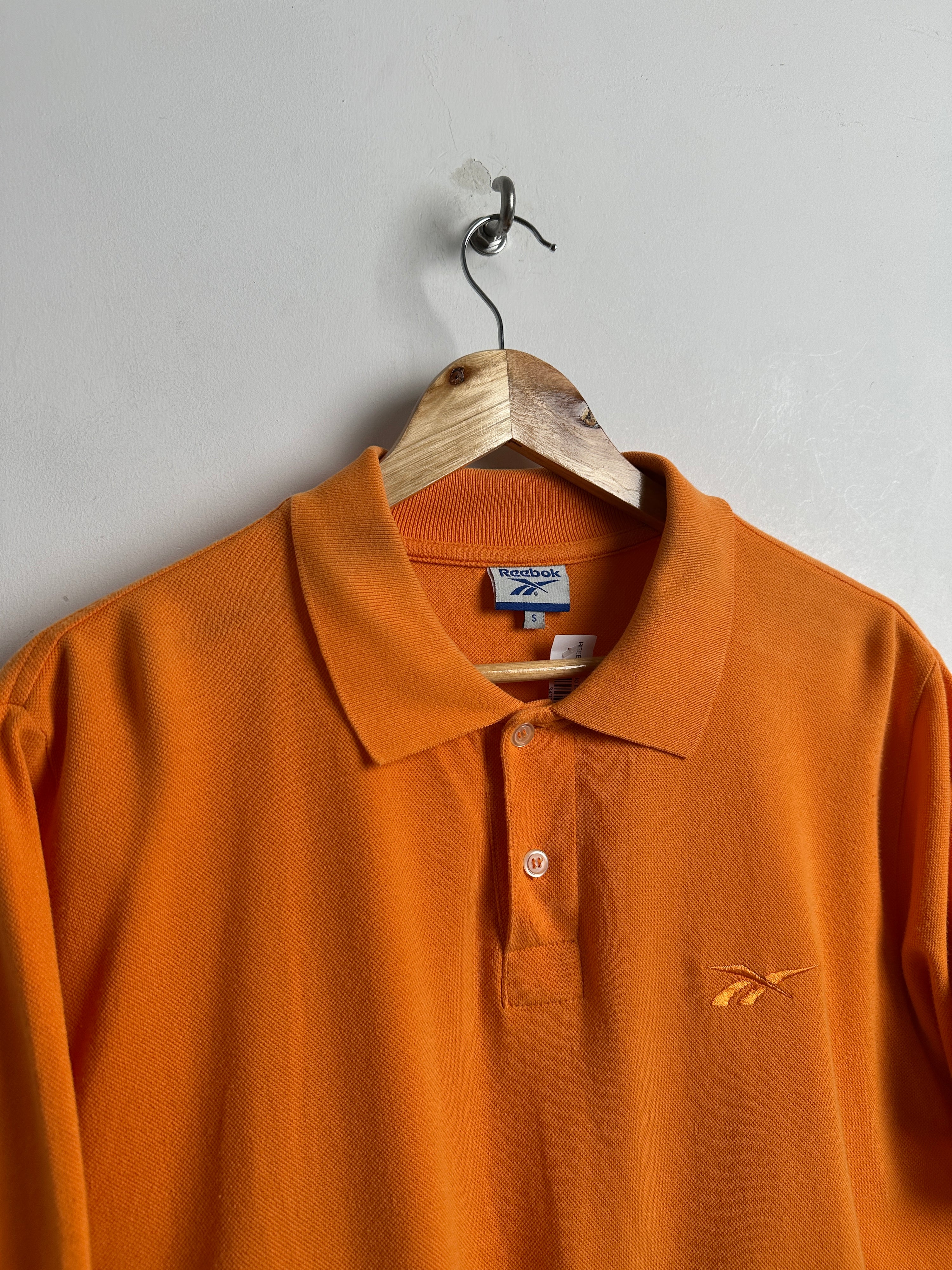 REEBOK short-sleeve polo shirt in orange