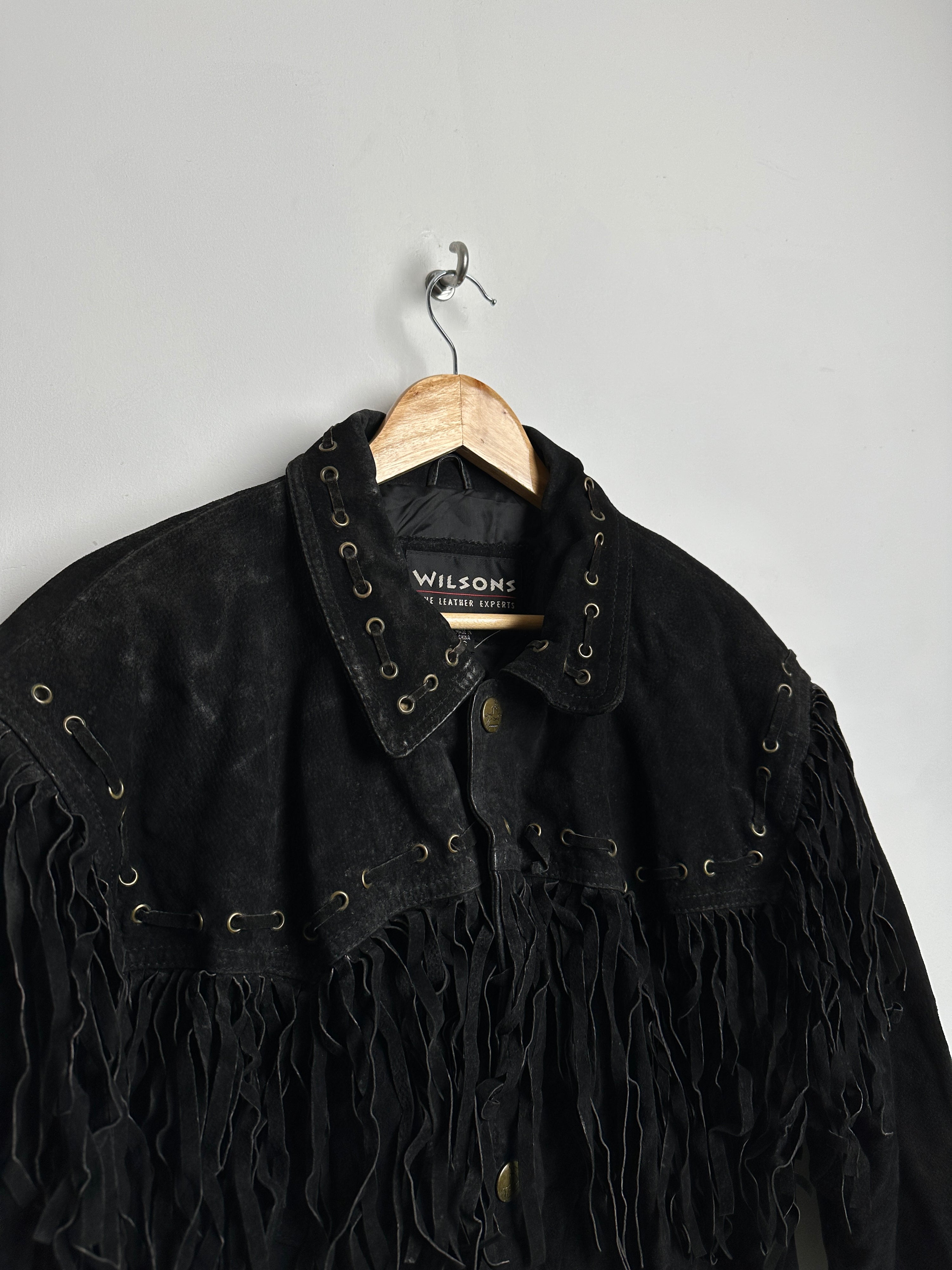 WILSONS black leather jacket with tassels