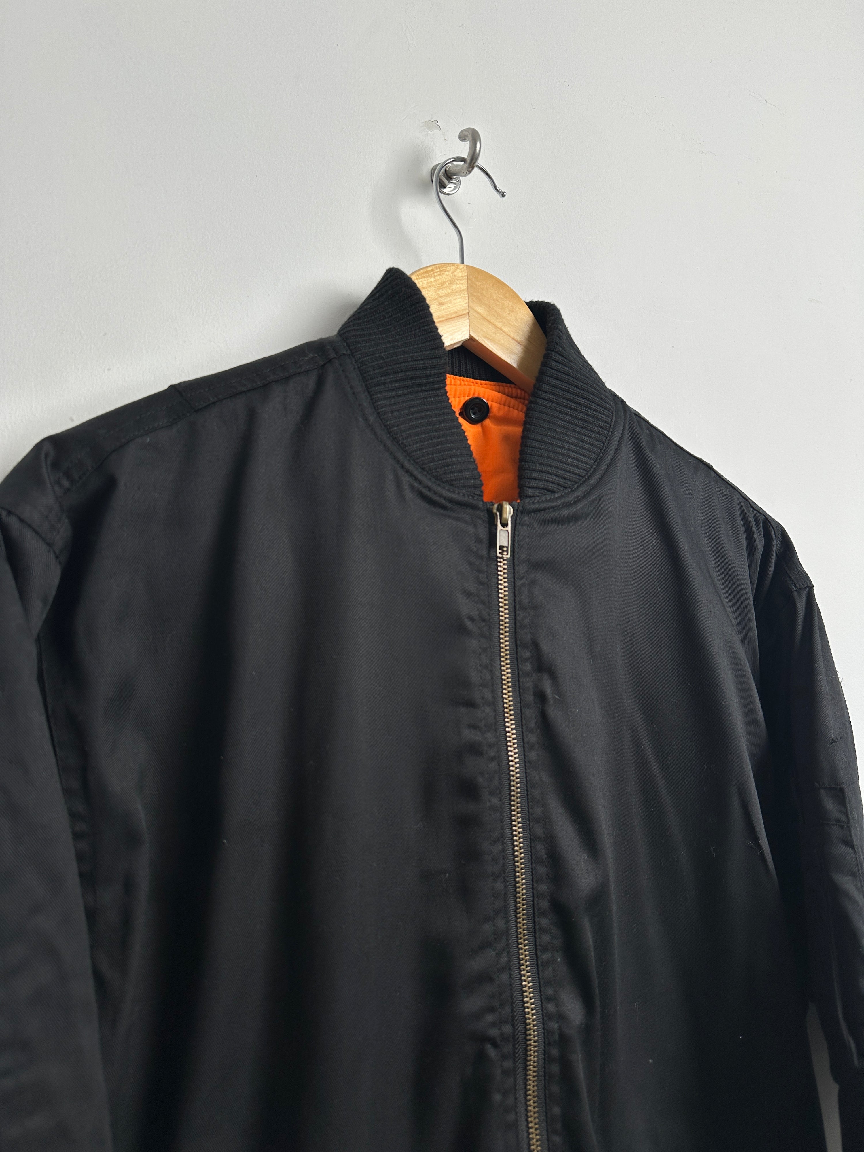 Follow me! Bomber jacket in black (with orange lining)