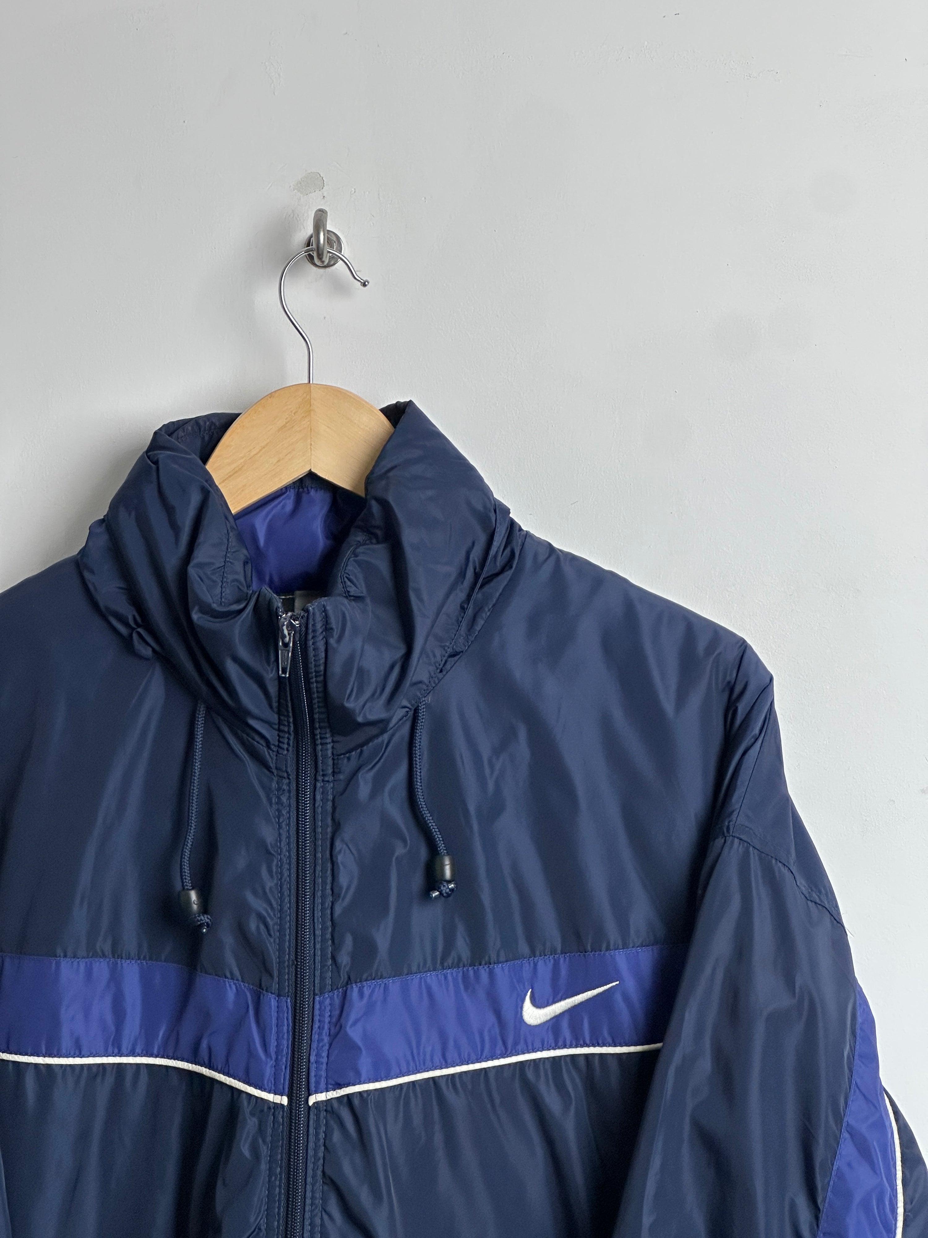 NIKE PUFFER JACKET IN BLUE