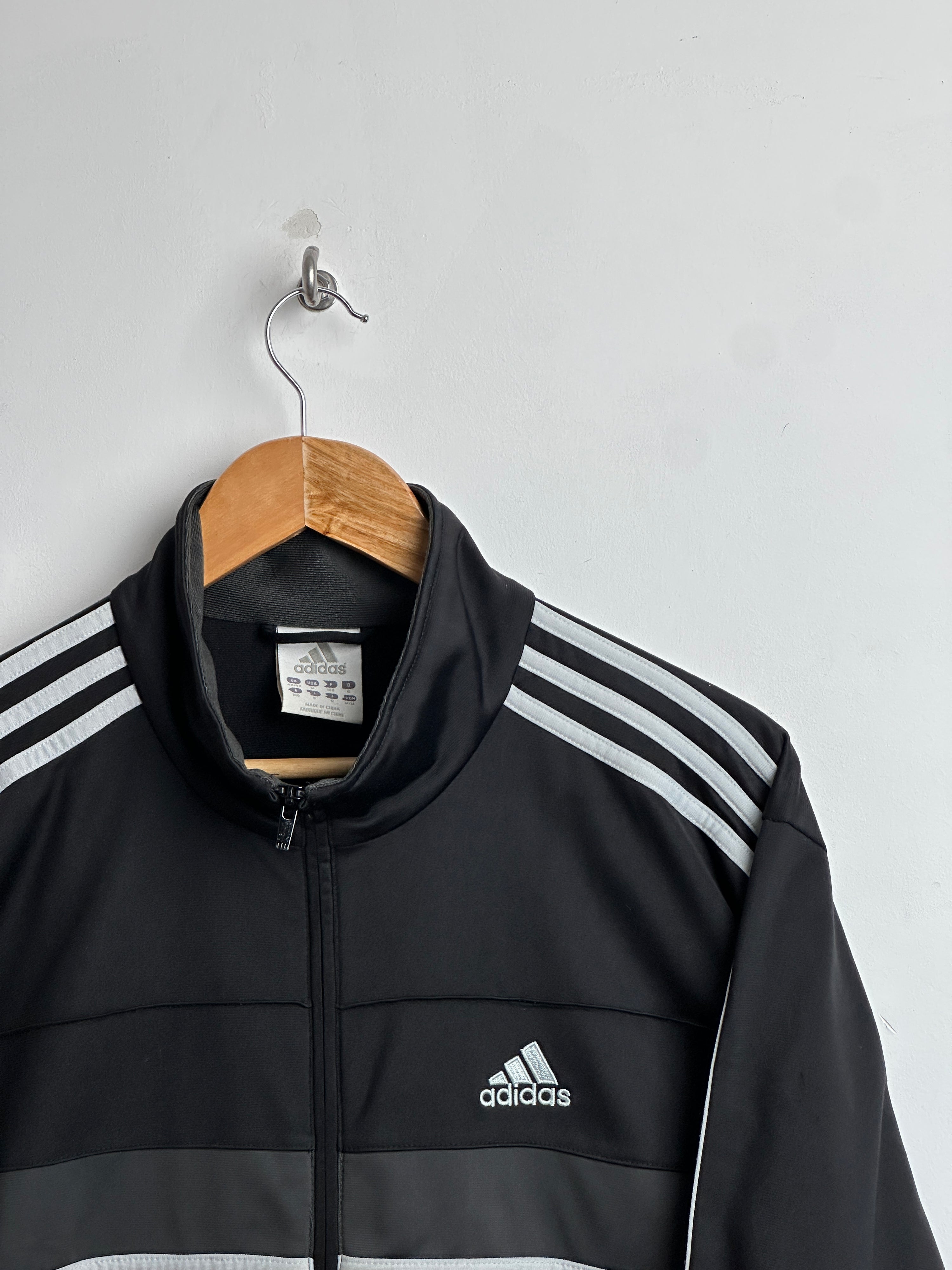 ADIDAS zip-up in black with red line