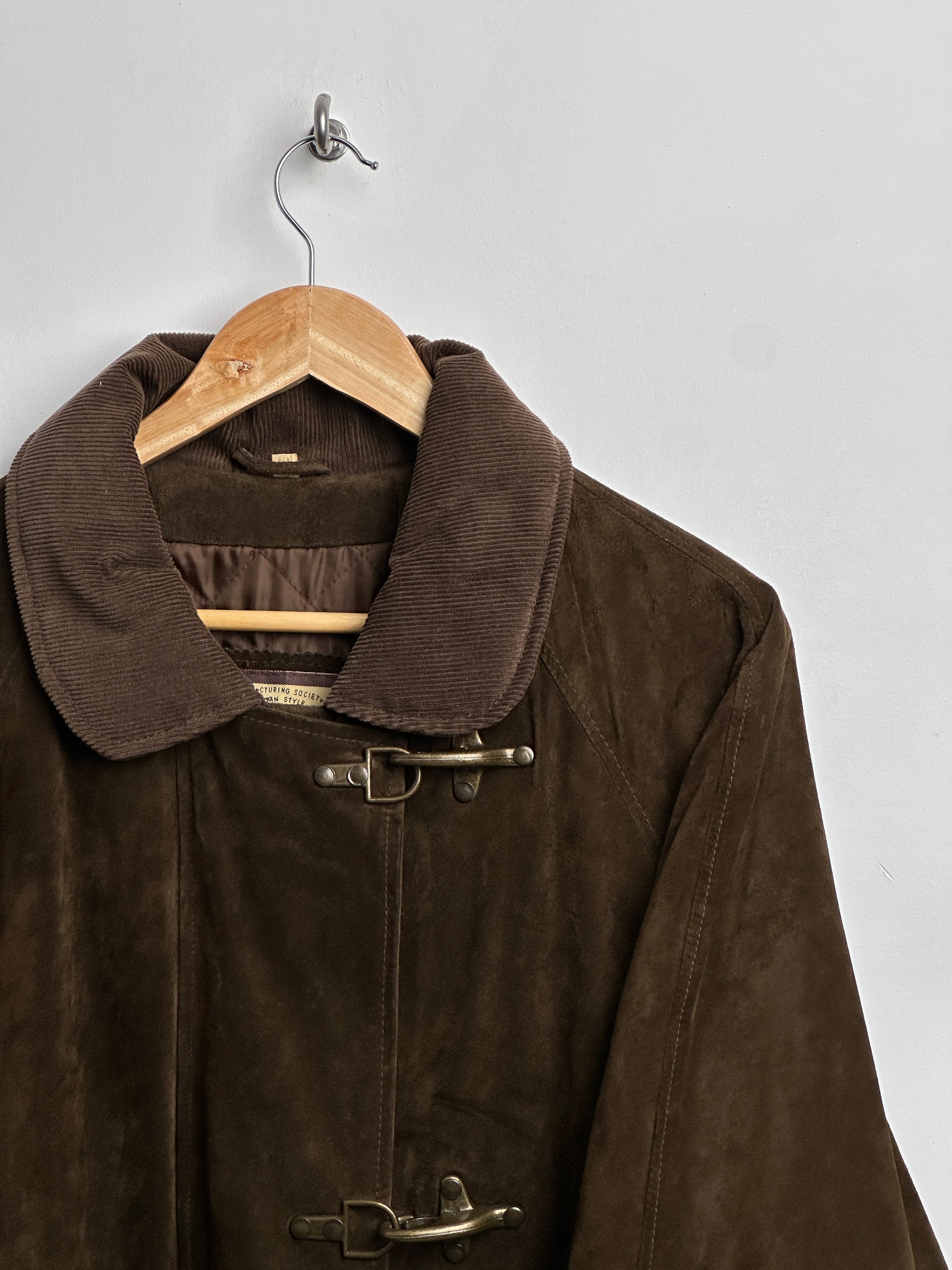 Vintage brown suede jacket with gold buckles