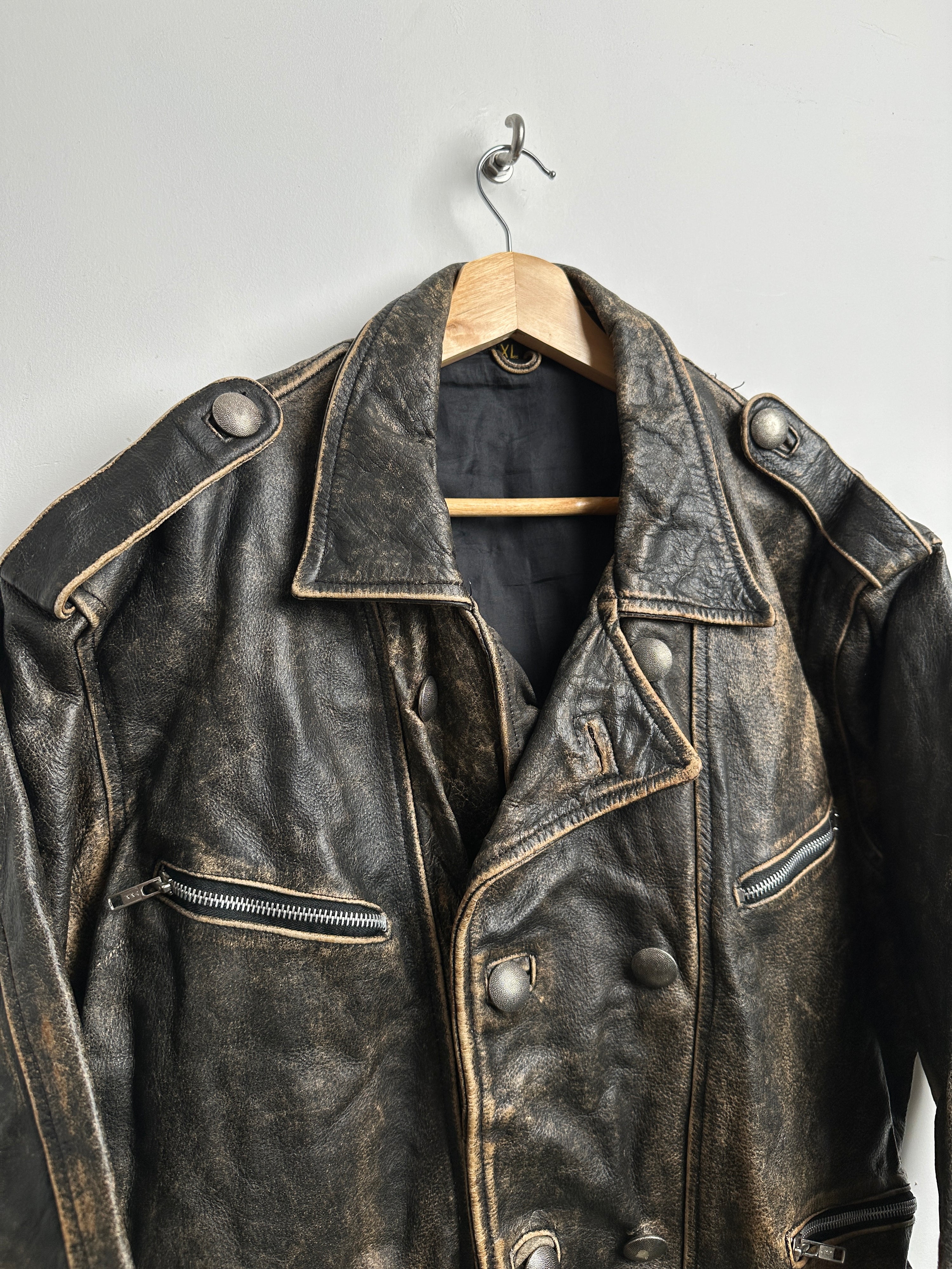 Vintage leather jacket with buckles