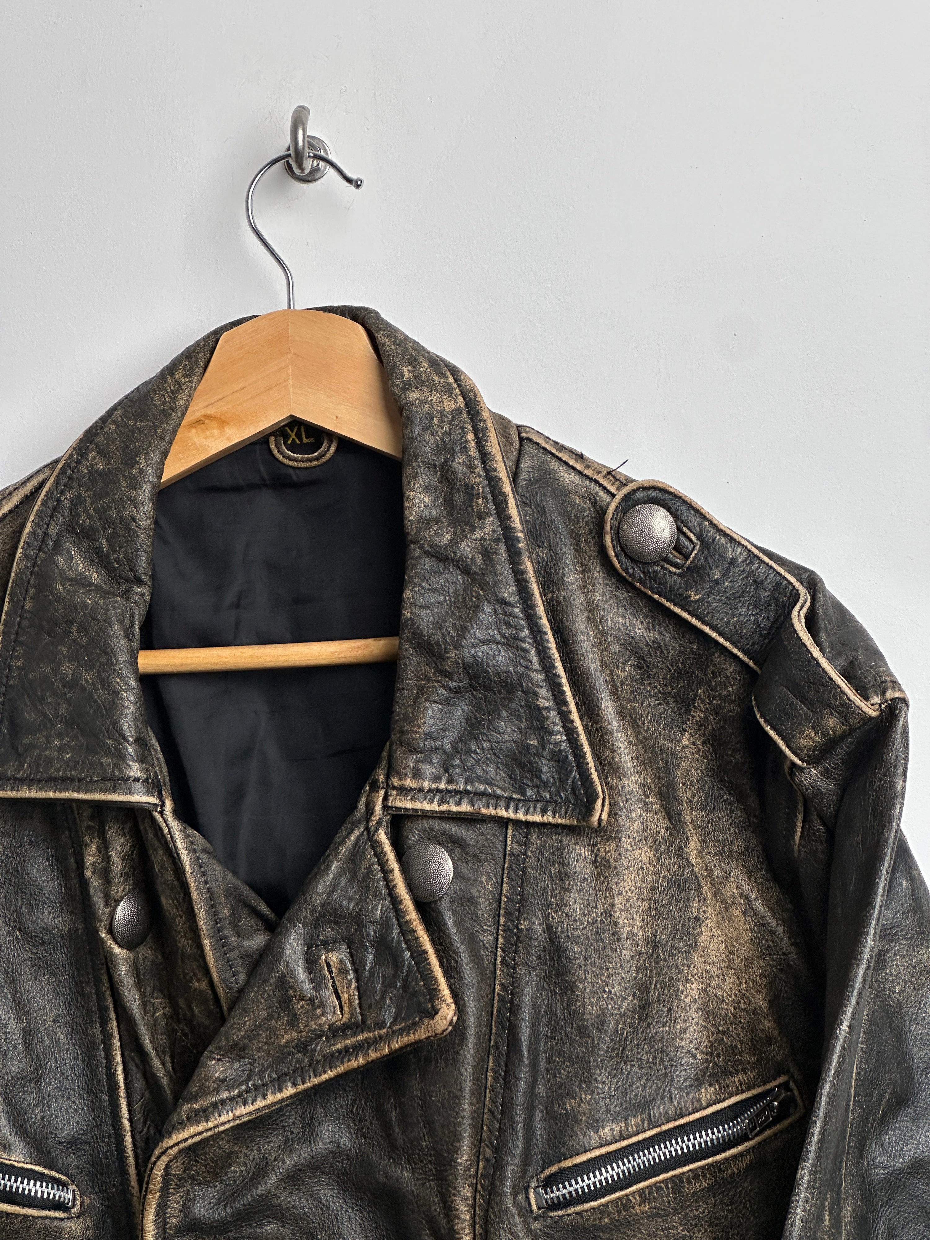 Vintage leather jacket with buckles