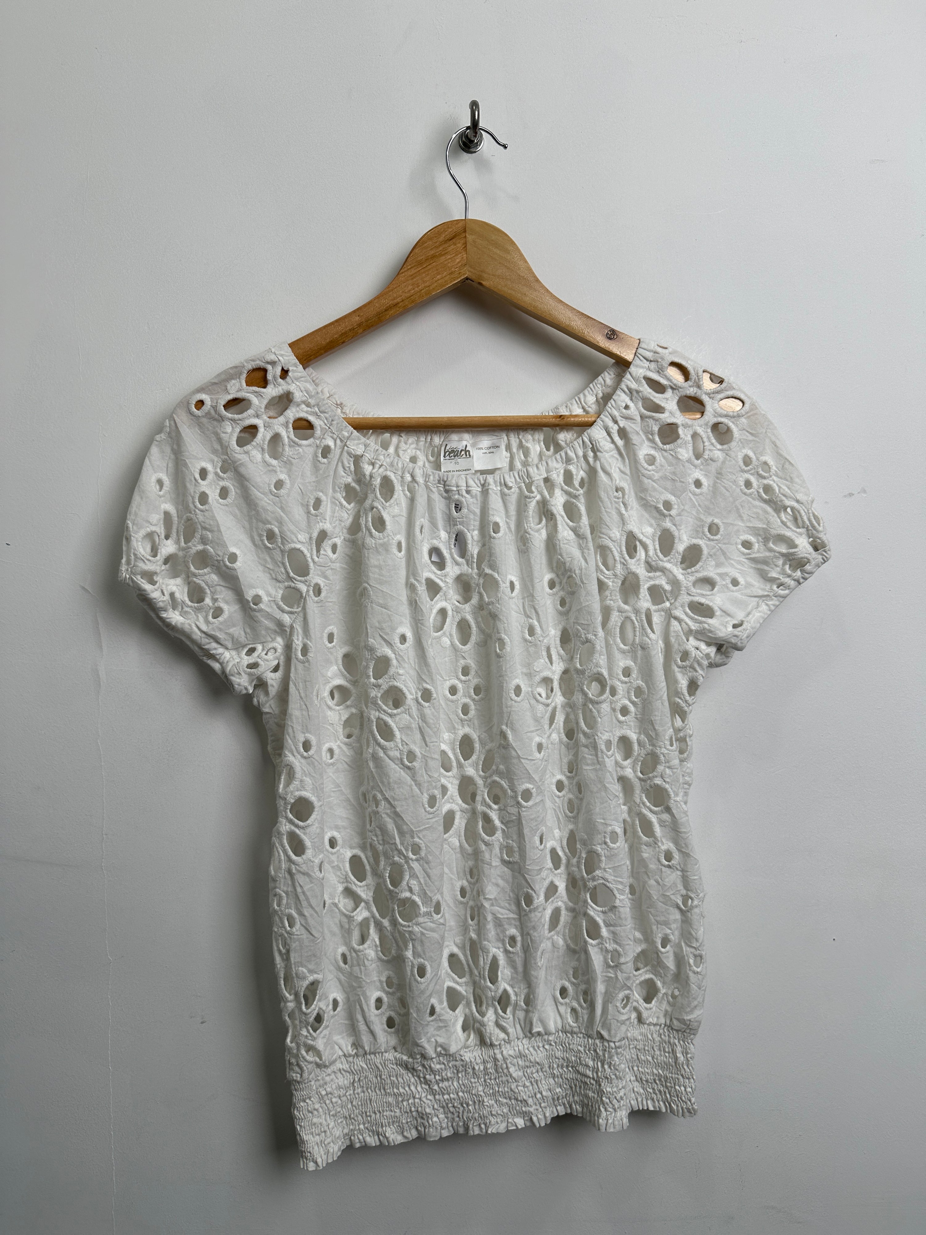 Floral cut-out blouse in white cotton