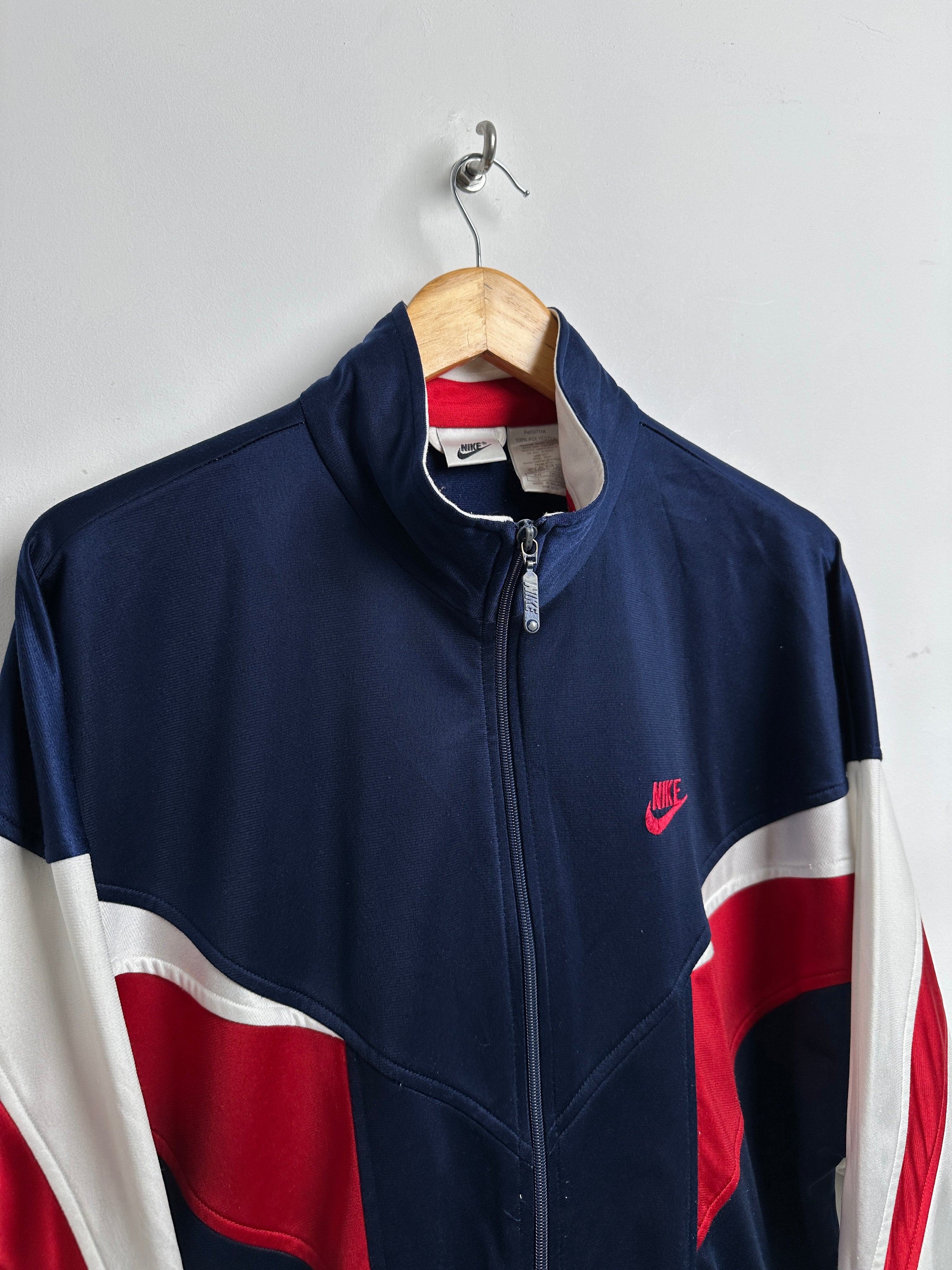 Nike zip up in blue red and white