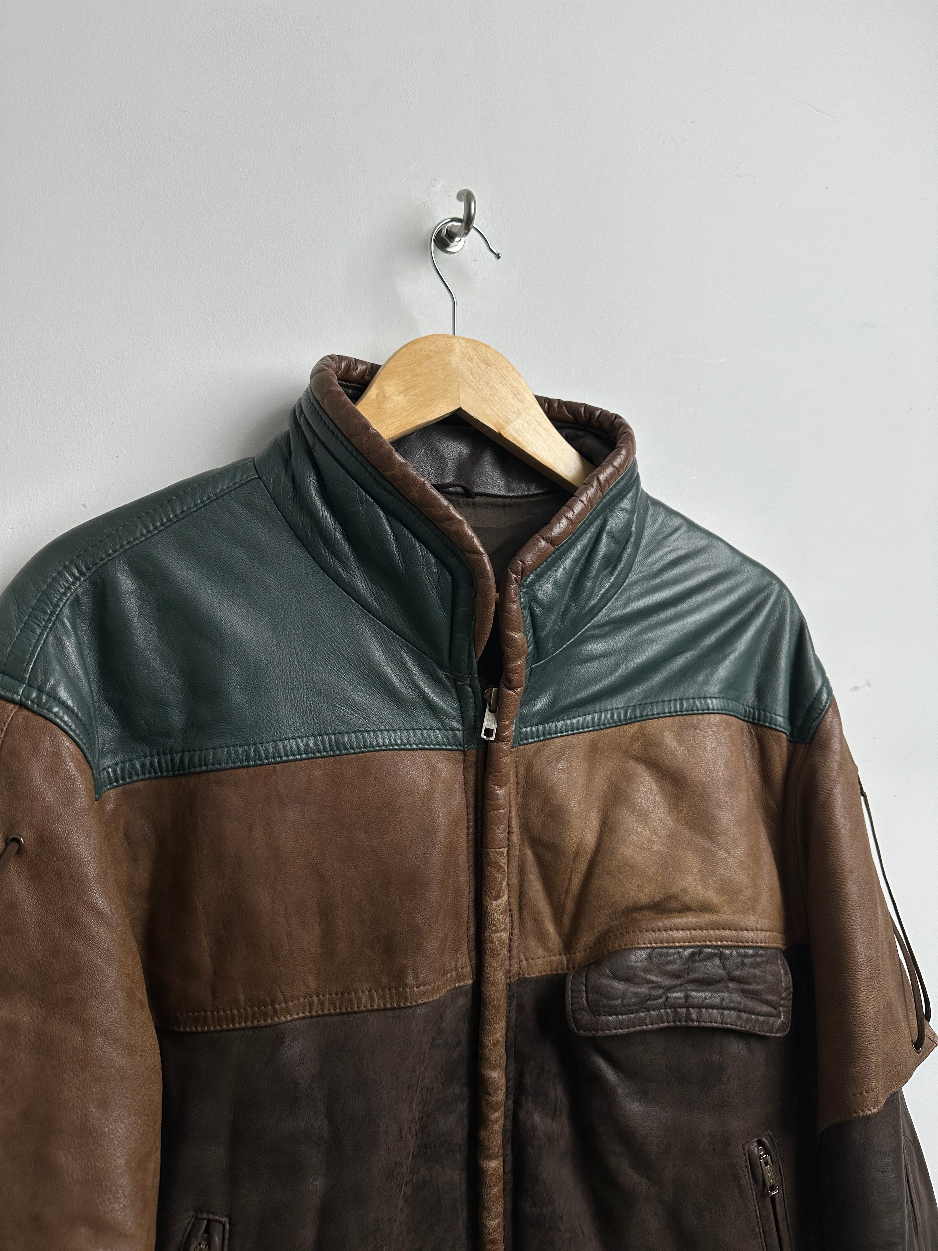 Vintage patchwork leather jacket in browns and green