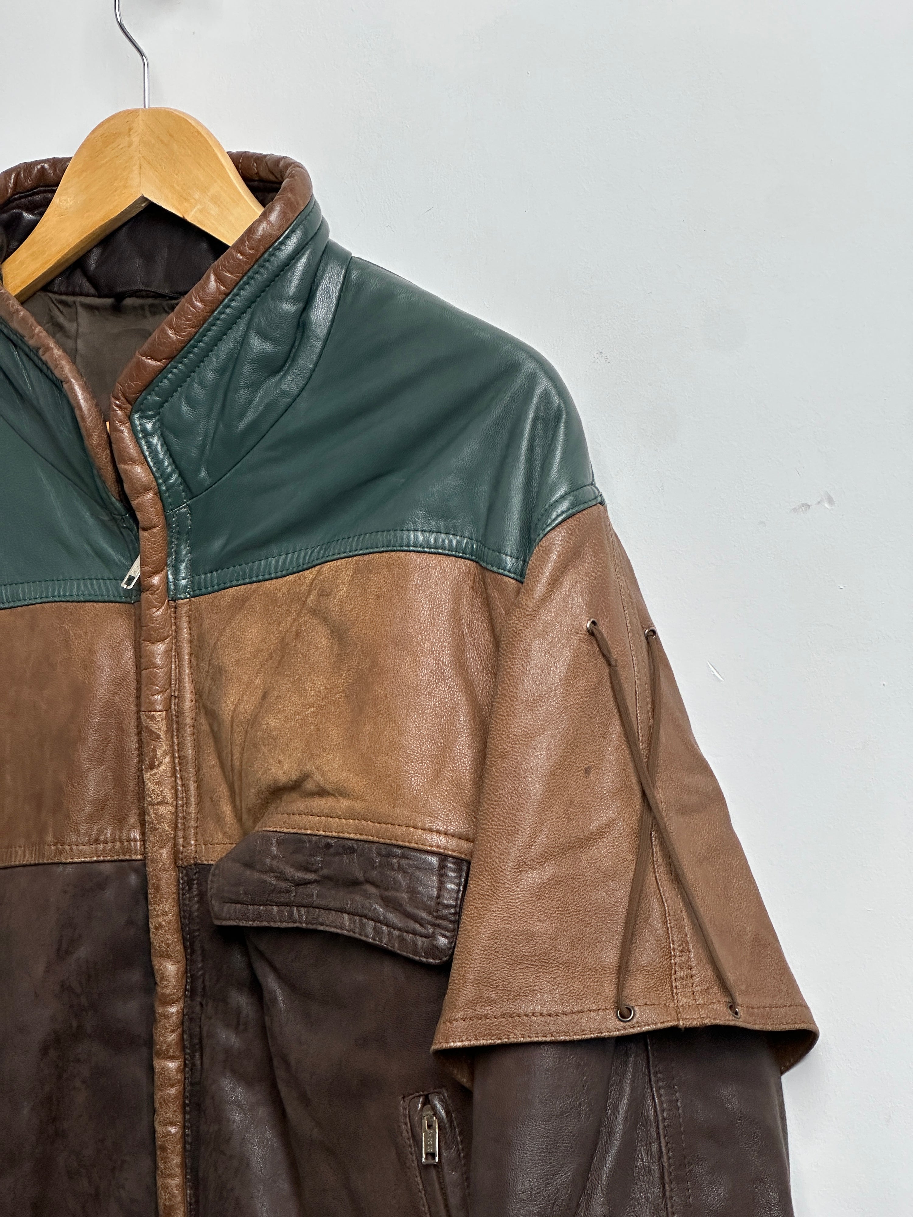 Vintage patchwork leather jacket in browns and green