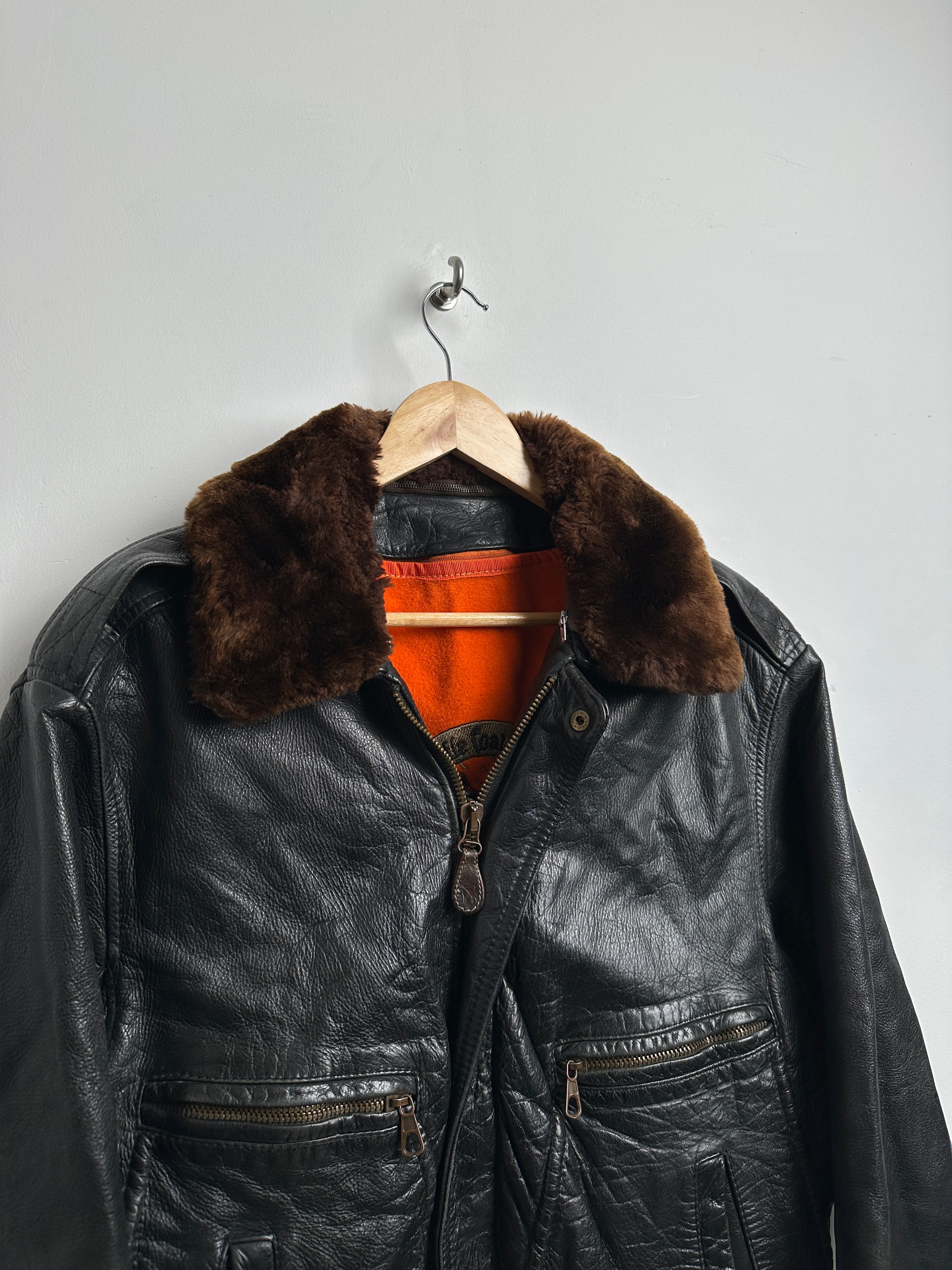 MARCO PIERGUIDI leather jacket with fur collar