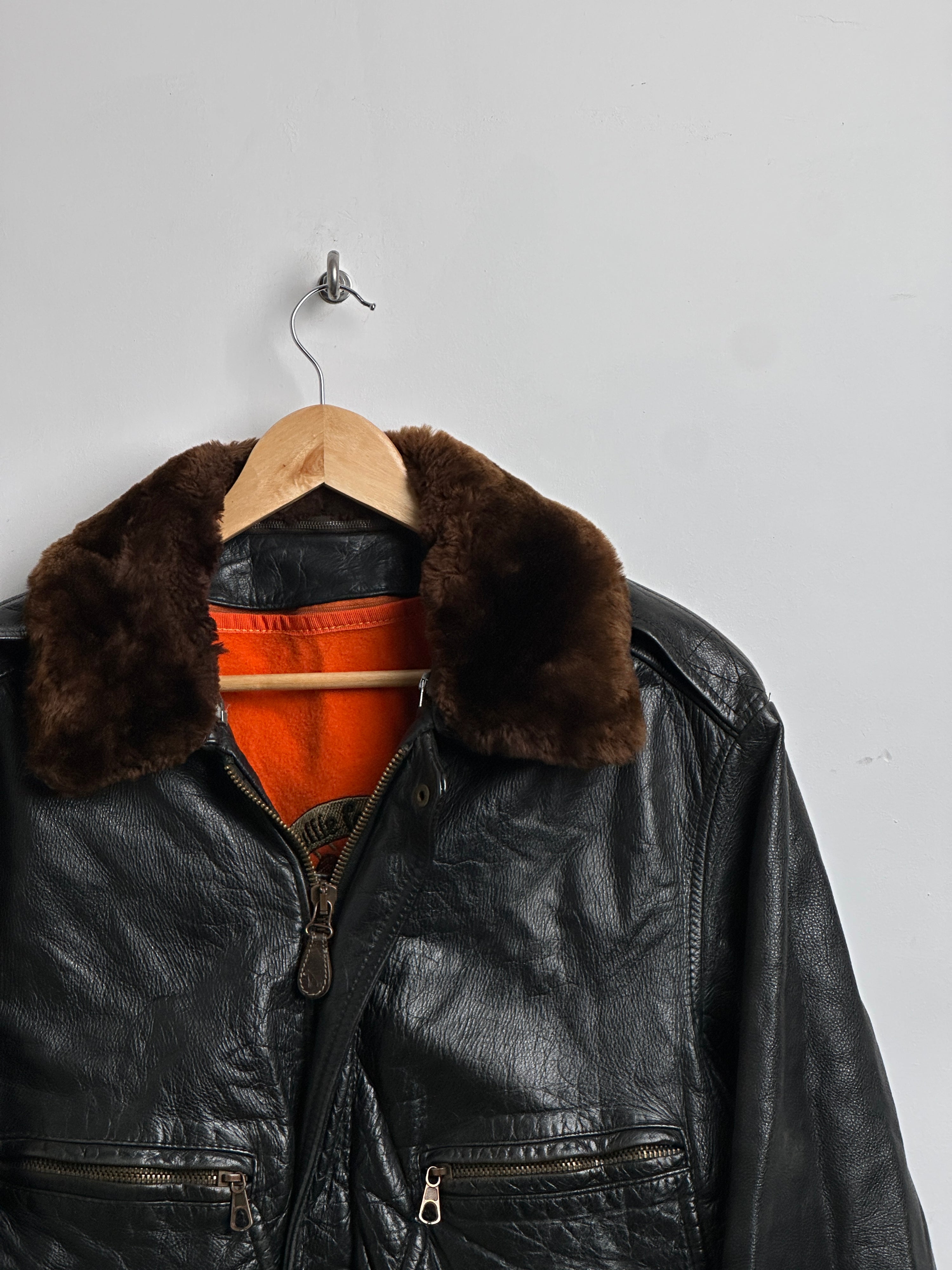 MARCO PIERGUIDI leather jacket with fur collar