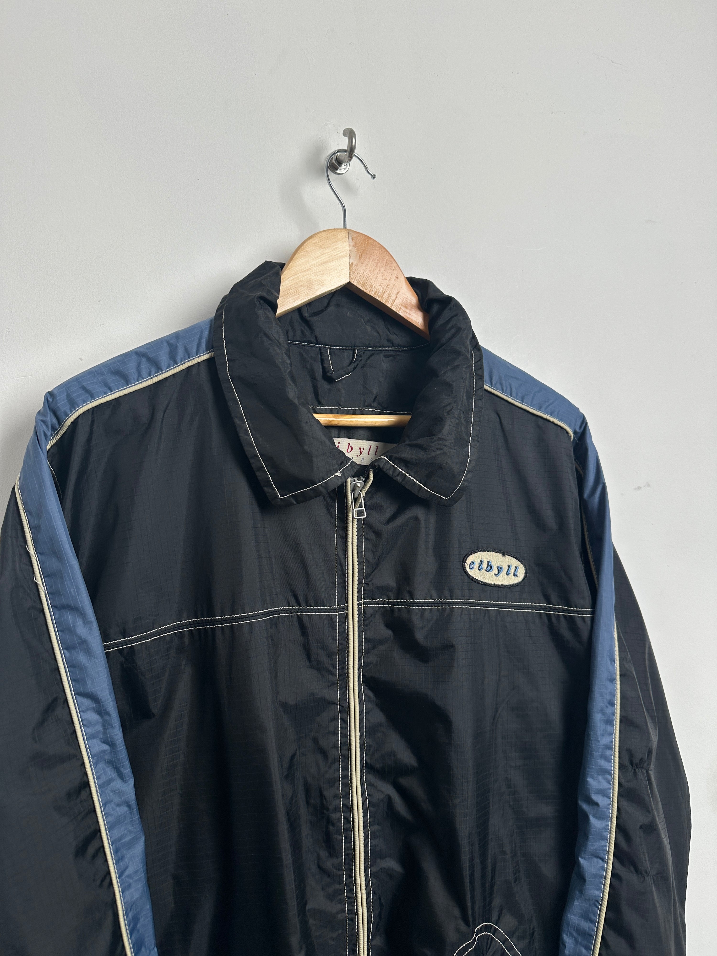 cibyll weather proof wind breaker jacket in blue and black