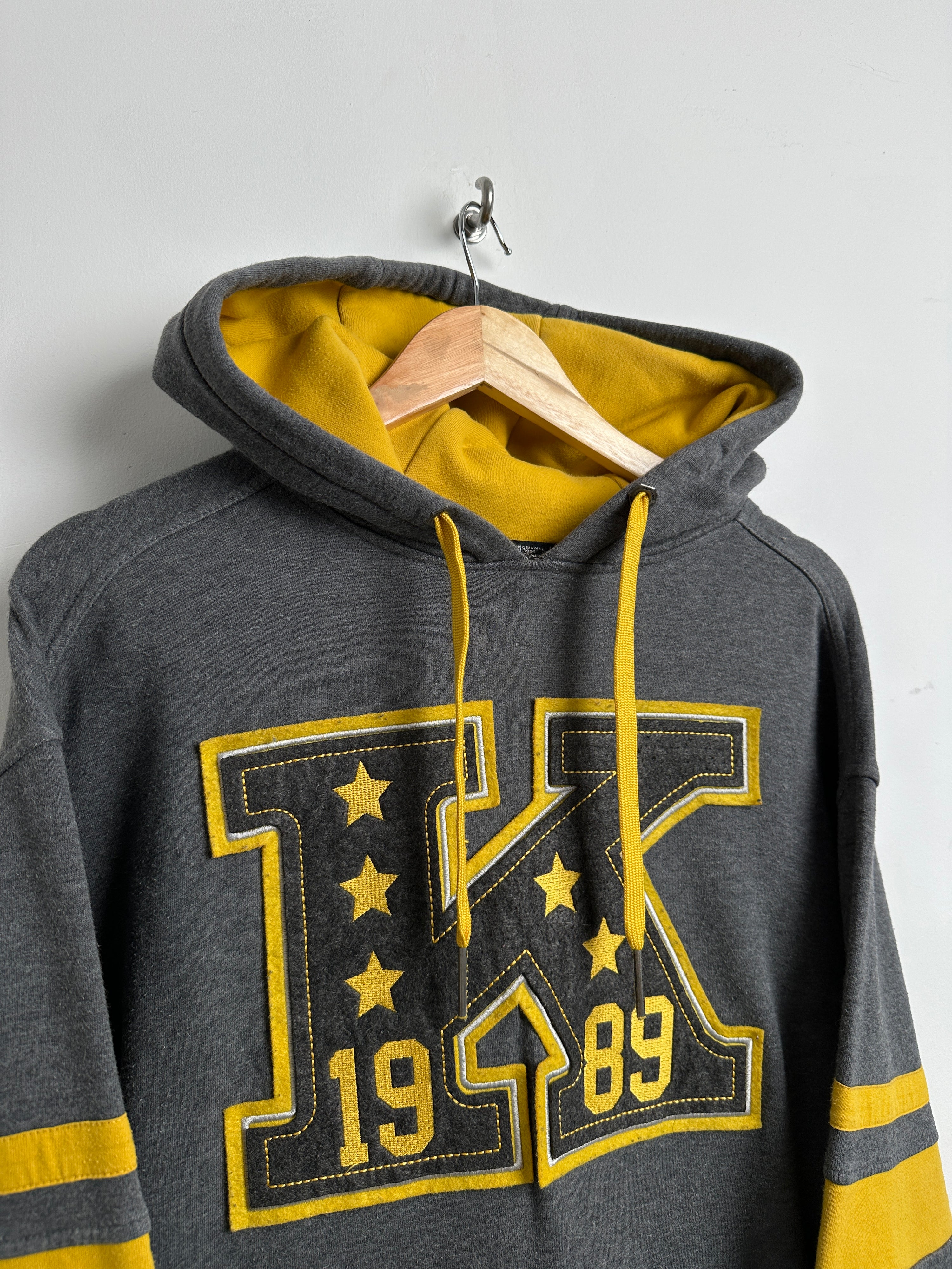 KANI 1989 hoodie in grey and yellow